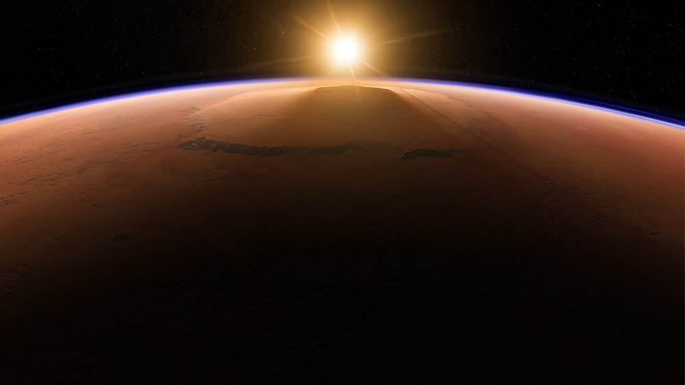 شروق الشمس فوق جبل اوليمبوس على المريخ، الجبل الأعلى في النظام الشمسي | رسوم: Kevin Gill
