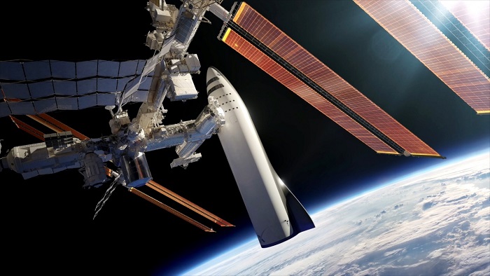 הדמיה של חללית הענק של מאסק, כשהיא מחוברת אל תחנת החלל הבינלאומית | איור: SpaceX