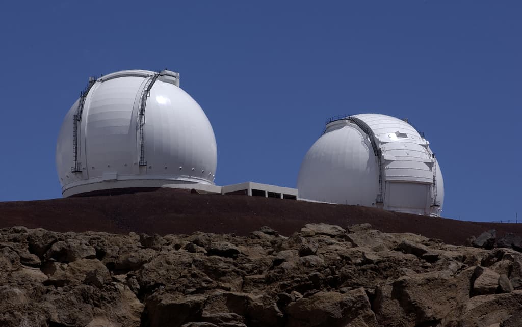 The two large telescopes that make up the Keck Observatory. Credit: T. Wynne / JPL