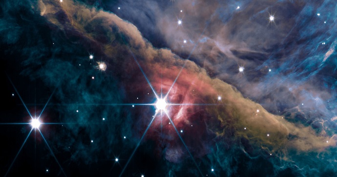 ערפילית אוריון בתמונה חדשה של טלסקופ החלל ווב. במרכז התמונה: אורניוס A מנסה להשתחרר מהגז והאבק הסובב אותו. קרדיט: NASA, ESA, CSA, PDRs4All ERS Team; image processing Salomé Fuenmayor