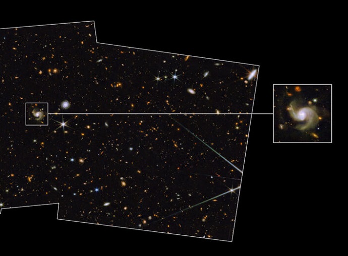 השדה העמוק הראשון של ווב. בהגדלה: מערבולת שנוצרה בהתמזגות של גלקסיות. קרדיט: NASA/ESA/CSA/A. Pagan (STScI)R. Jansen (ASU)/Science: R. Jansen, J. Summers, R. O'Brien, R. Windhorst (ASU)/A. Robotham (ICRAR / UWA)/A. Koekemoer (STScI)/C. Willmer (UofA)/PEARL
