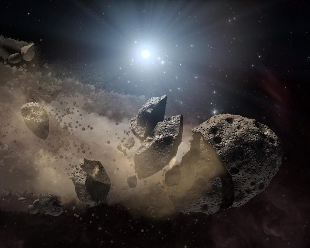 אילוסטראציה של אסטרואיד מתפרק. קרדיט: NASA/JPL-Caltech