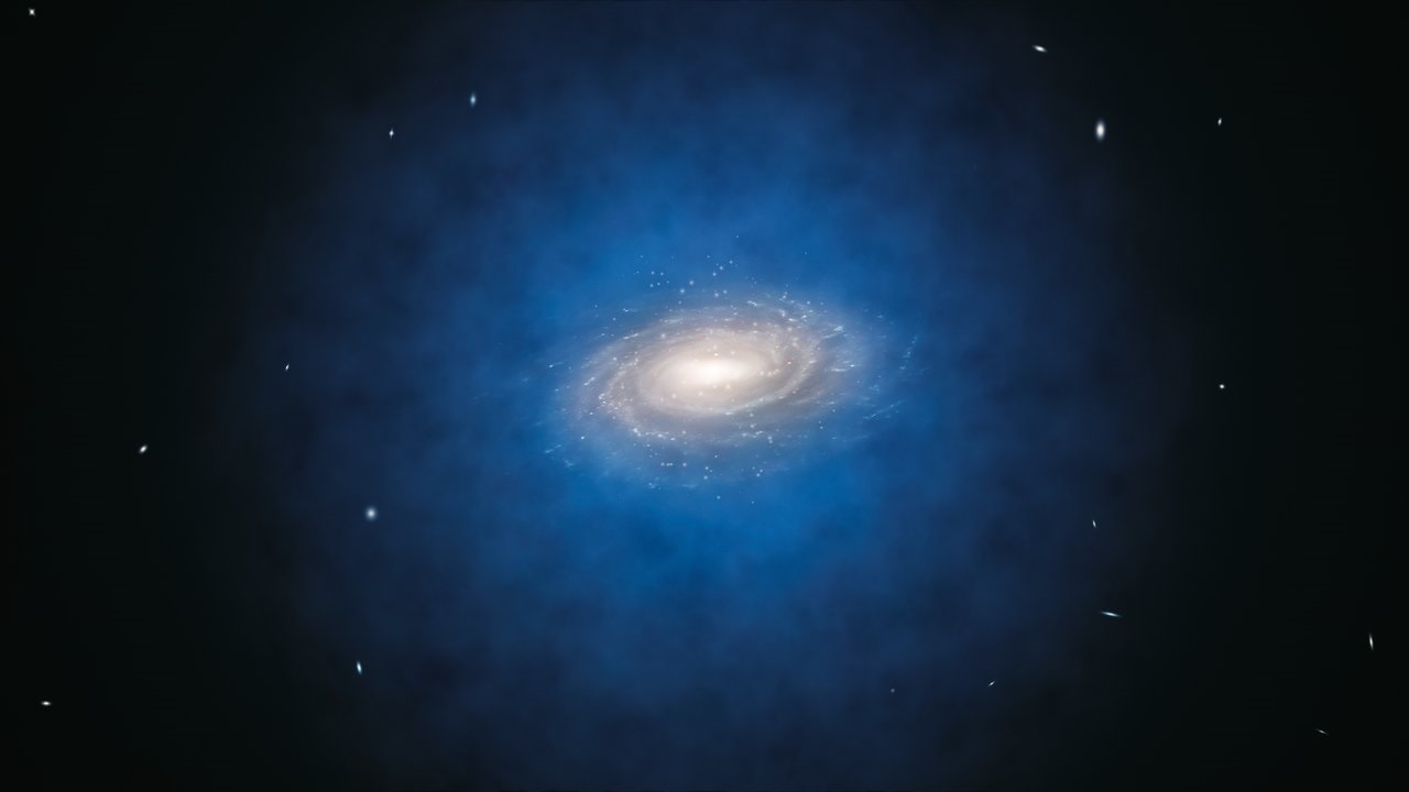 הדמיית אומן של גלקסיית שביל החלב, ובה הפיזור המשוער של החומר האפל כהילה כחולה העוטפת אותו. קרדיט: ESO/L. Calçada